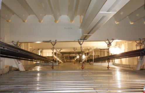 Cabling and steelwork within the mezzanine floor under the bridge deck.