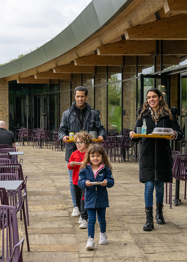 Family stopping for a rest at motorway service station