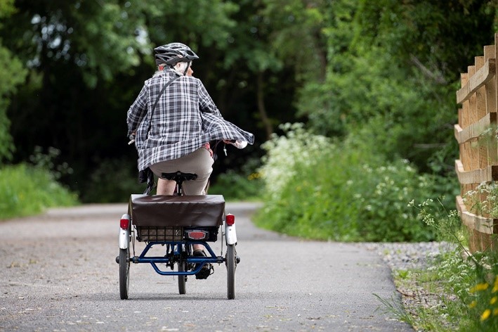 woman on tricycle