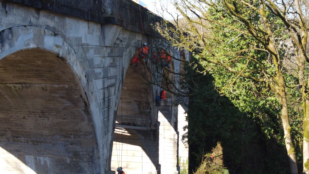 Concrete repairs being undertaken by rope work during phase 2