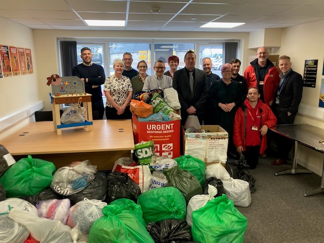 Midlands Air Ambulance Charity representatives with National Highways’ staff and suppliers at the Stafford Park depot