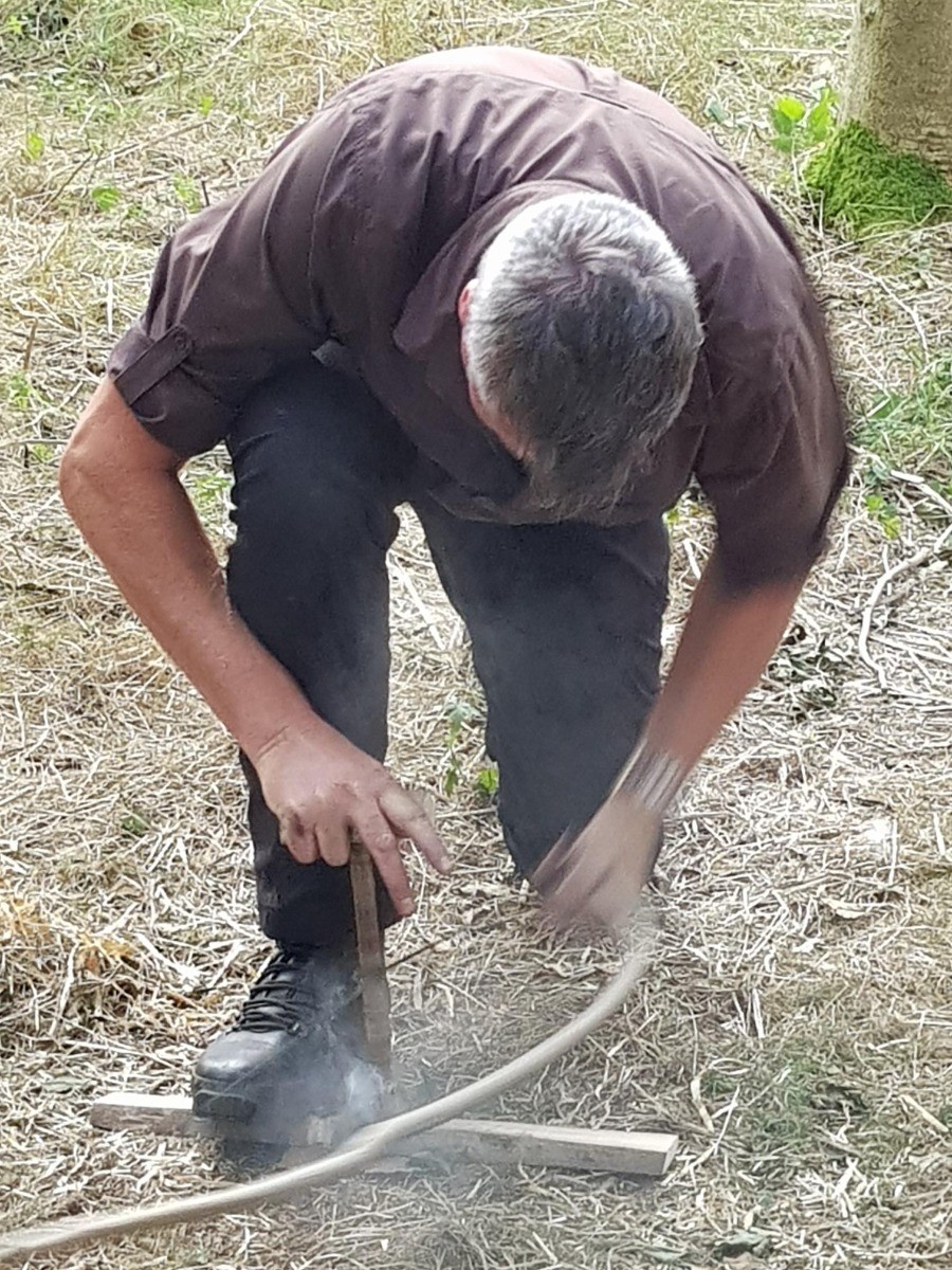 John Sullivan shows the young people how to light a fire