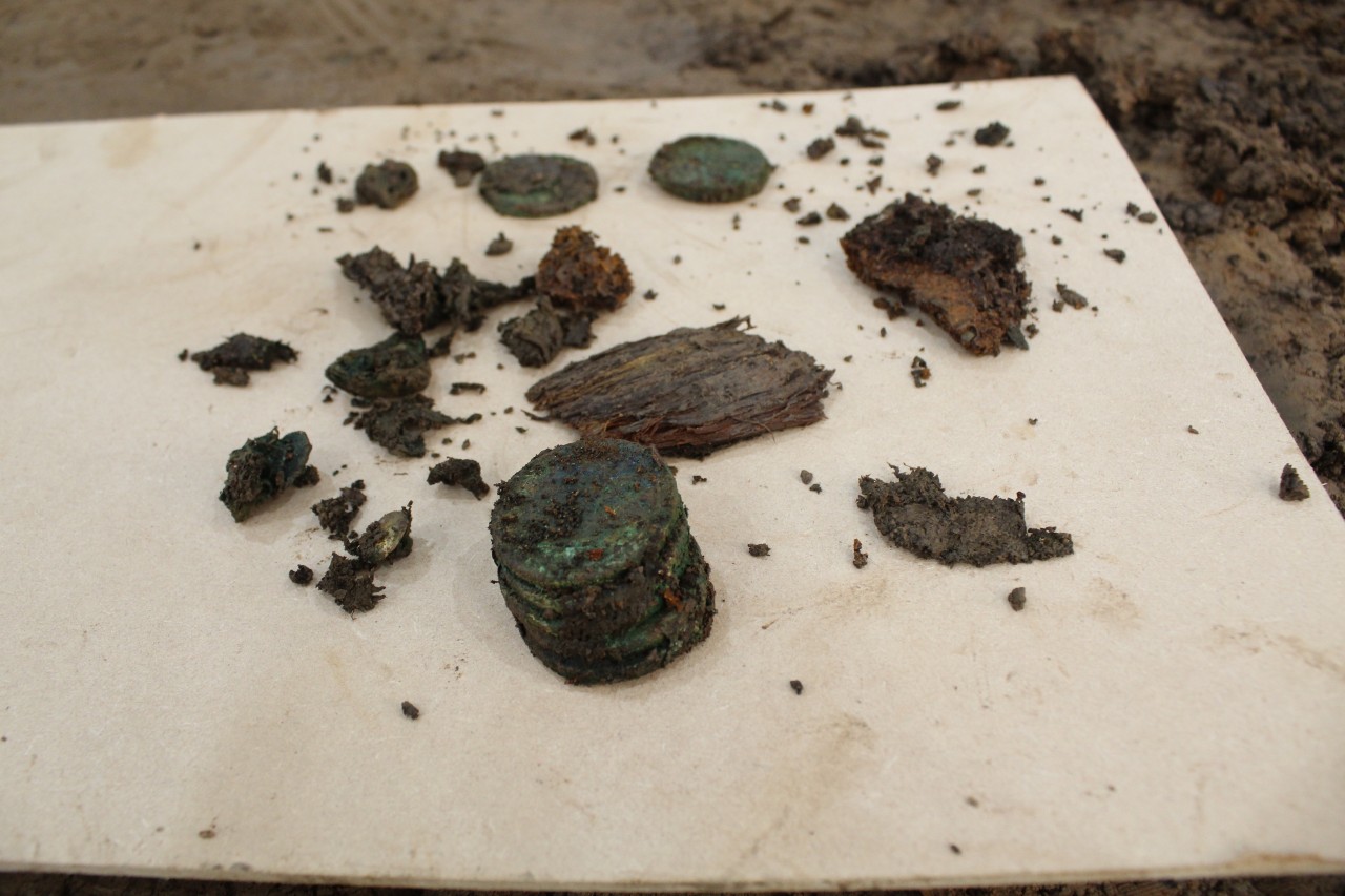 Coins laid out on slab