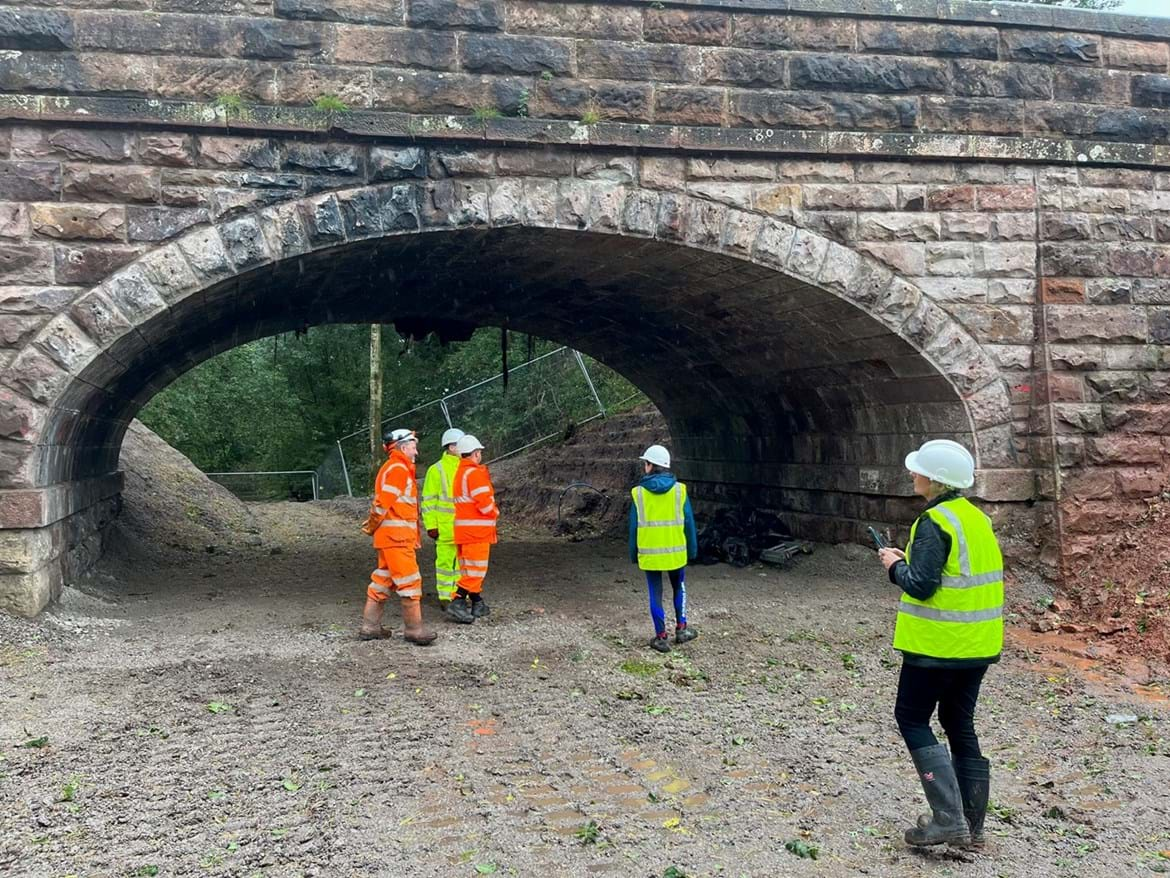 Representatives from Westmorland and Furness Counci standing by the bridge