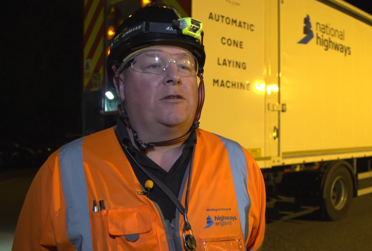 Image showing Technical officer for CPS, Dale Hicks standing by the automated cone laying vehicle