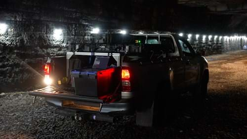 Muon detector takes measurements from the back of a truck moving slowly through the tunnel.